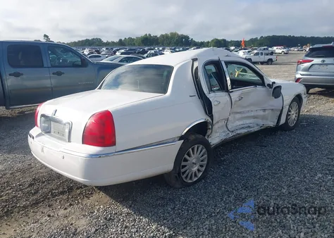 2004 Lincoln Town Car Signature из США, поврежденный, VIN 1LNHM81W74Y623806
